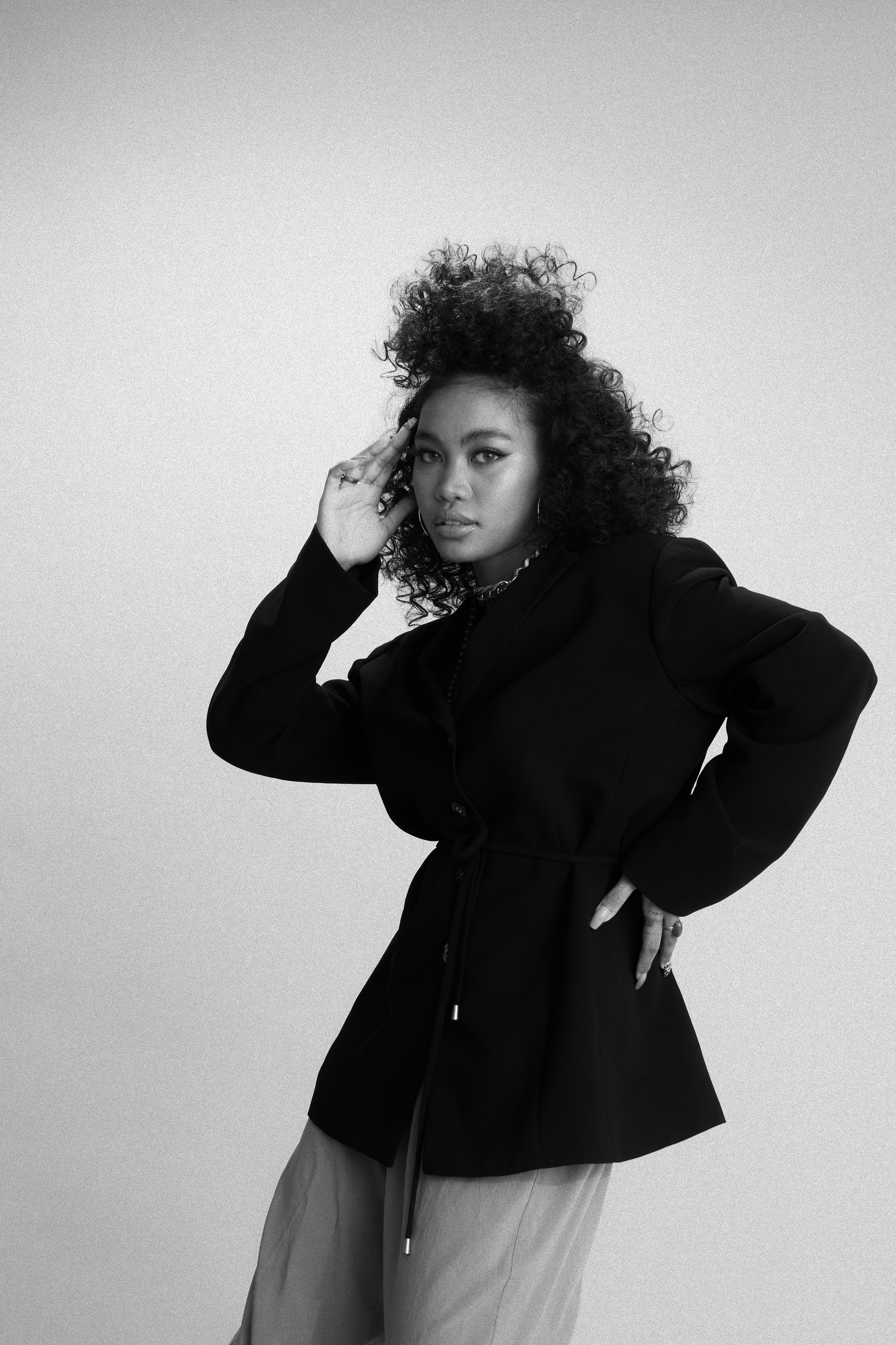 Young Woman in Baggy Clothes